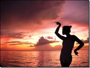 shadow of a crew member, sunset in Anse Noire, Martinique