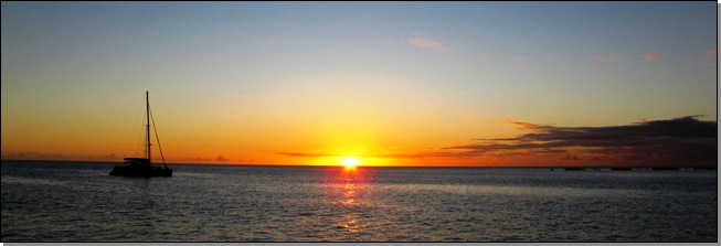 coucher de soleil et catamaran